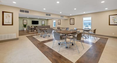 Interior common area with tables and chairs