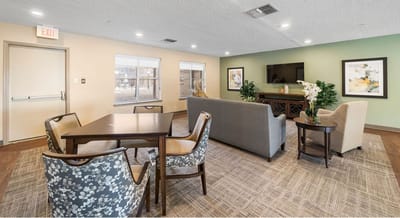 Common area with seating and TV.