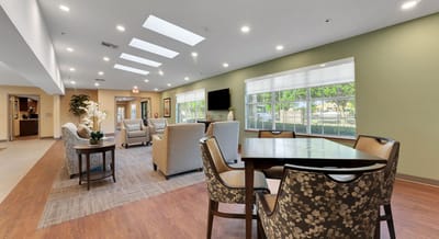 Interior common area with seating and natural light.