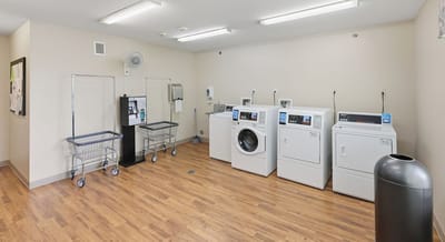 Laundry room with washers and dryers