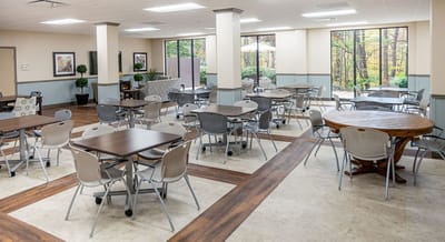 Bright dining room with tables and chairs