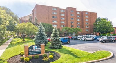 Exterior view of Campbell Court with parking area