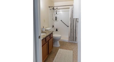 Accessible bathroom with safety features.