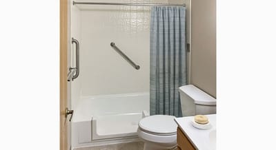 Simple bathroom with shower and curtain