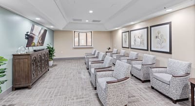 Common area with seating and TV