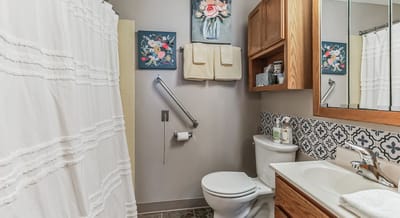 Clean bathroom with floral decor