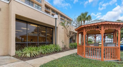 Outdoor gazebo area beside the facility