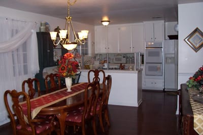 Bright dining area with wooden table and chairs