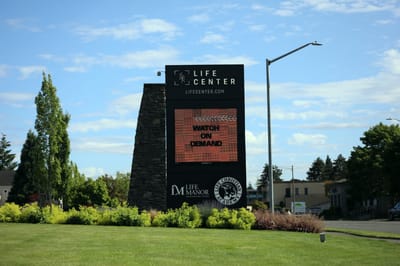 Life Manor sign near the entrance of the facility