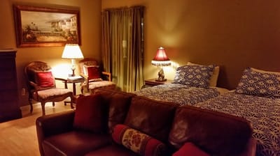 Brightly lit resident room with cozy furniture