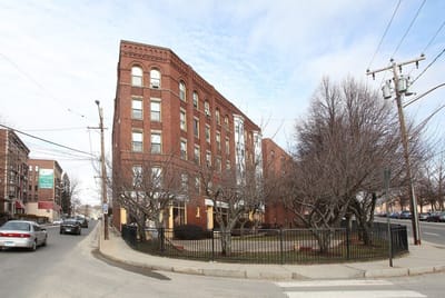 Exterior view of Enterprise Apartments and Abbott Towers