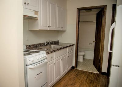 Interior view of a small kitchen area in senior housing