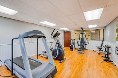 Interior view of a fitness center with exercise equipment
