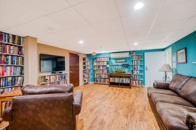 Interior common area with bookshelves and seating