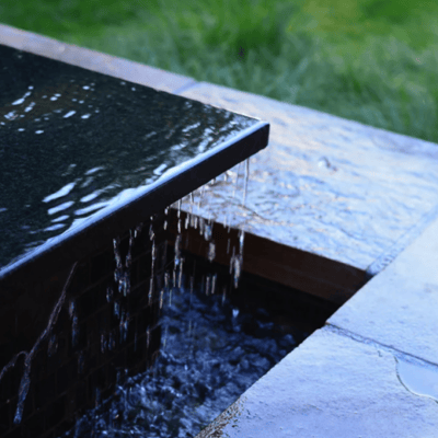 Close-up of a tranquil water feature in a garden