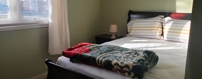 Cozy resident room with a neatly made bed