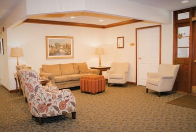 Cozy common area with seating and artwork
