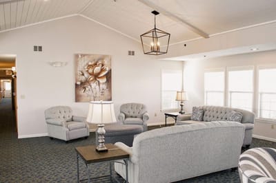 Cozy common area with seating and natural light