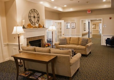 Cozy common area with seating and a fireplace
