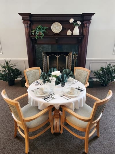 Elegant dining table set with dishes and decor