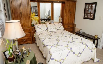 Cozy private resident room with a bed and decor
