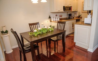 Dining table with chairs in an inviting kitchen space