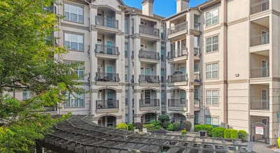 Exterior view of a senior living facility with balconies