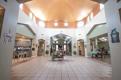 Bright common area with colorful decor and residents