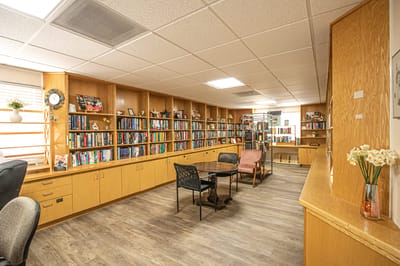 Interior of a cozy library area with bookshelves