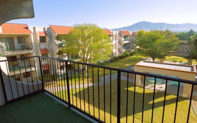 View from balcony overlooking courtyard and building complex