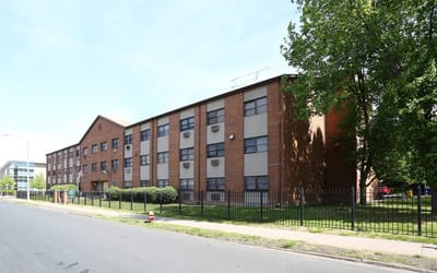 Exterior view of Faith Manor Apartments building