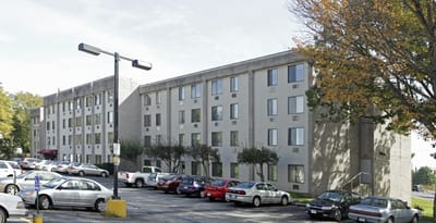 Exterior view of East Gate Apartments building