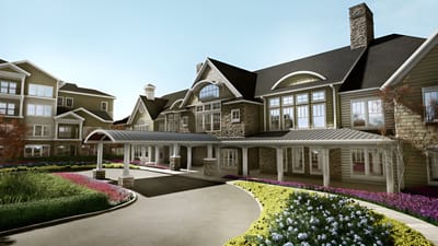 Exterior view of the facility with gardens and walkway