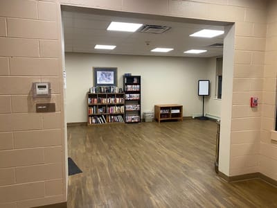 Interior view of a common area with bookshelves