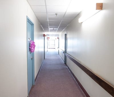 Bright hallway of a senior living facility