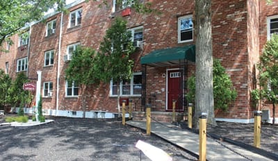 Exterior view of Grove Hill Apartments building entrance