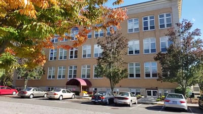 Exterior view of the River Park Apartments building