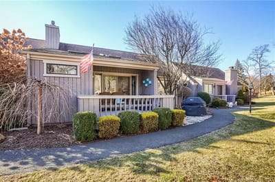 Exterior view of assisted living cottages with gardens