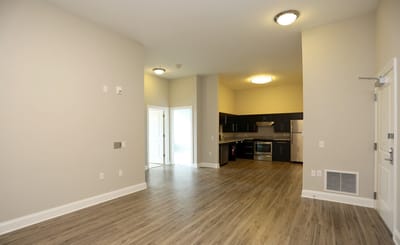 Spacious kitchen and living area in a senior apartment