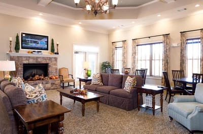 Comfortable common area with seating and fireplace