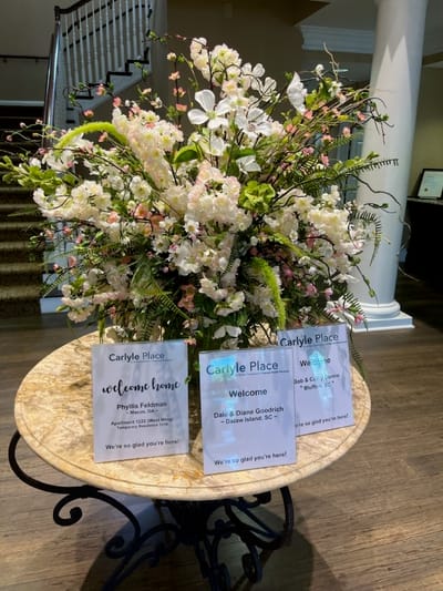 Flower arrangement with welcome signs in the lobby