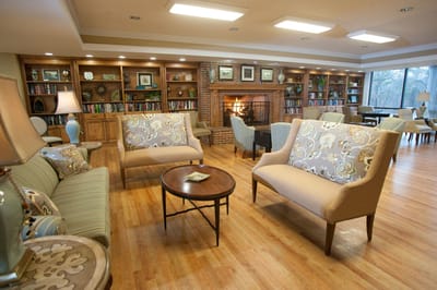 Cozy common area with seating and a fireplace