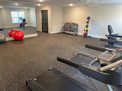 Interior view of a gym with fitness equipment