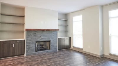 Bright and modern common area with a fireplace