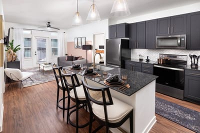 Modern kitchen interior with dining setup