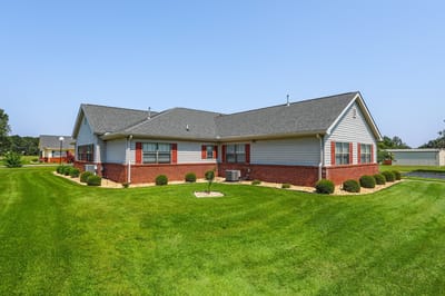 Exterior view of Springfield Gardens with well-maintained lawn