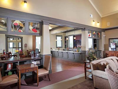 Interior view of a cozy common area with seating