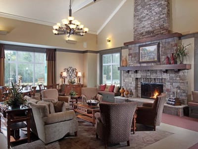 Cozy common area with seating and a fireplace