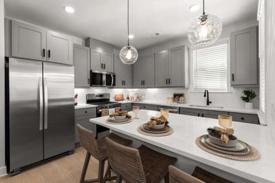 Modern kitchen interior with dining setup