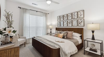 Well-decorated resident bedroom with natural light